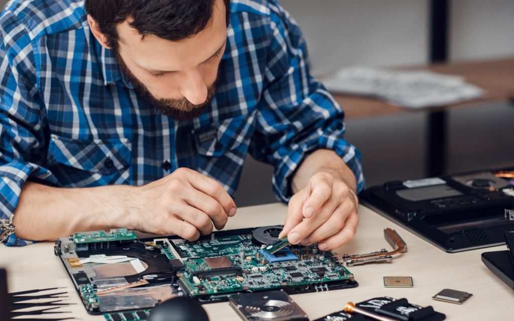 engineer working with hardware devices