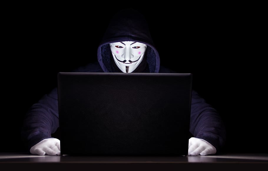 Blackhat hacker with Anonymous mask