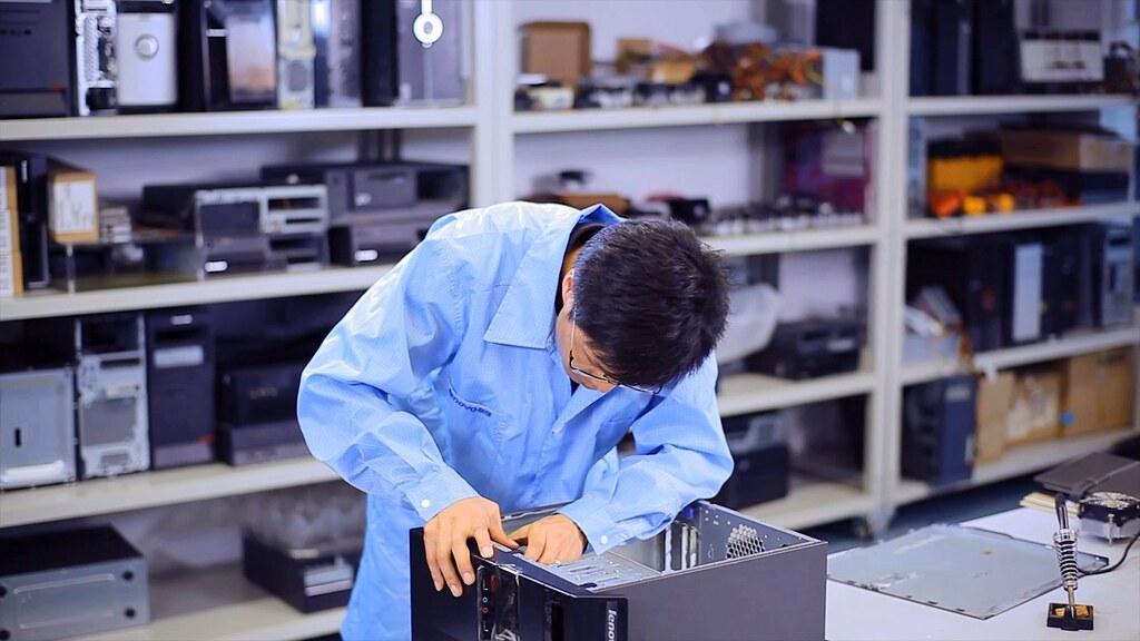 a computer engineer fixing hardware devices