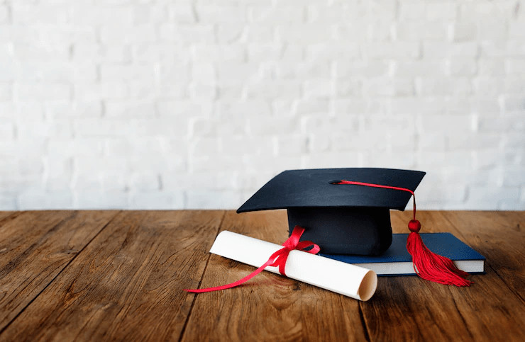 graduation hat and diploma