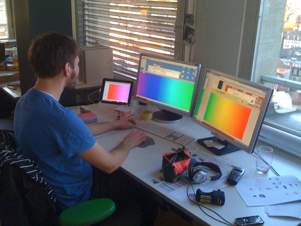 designer using graphic tools with multiple colors